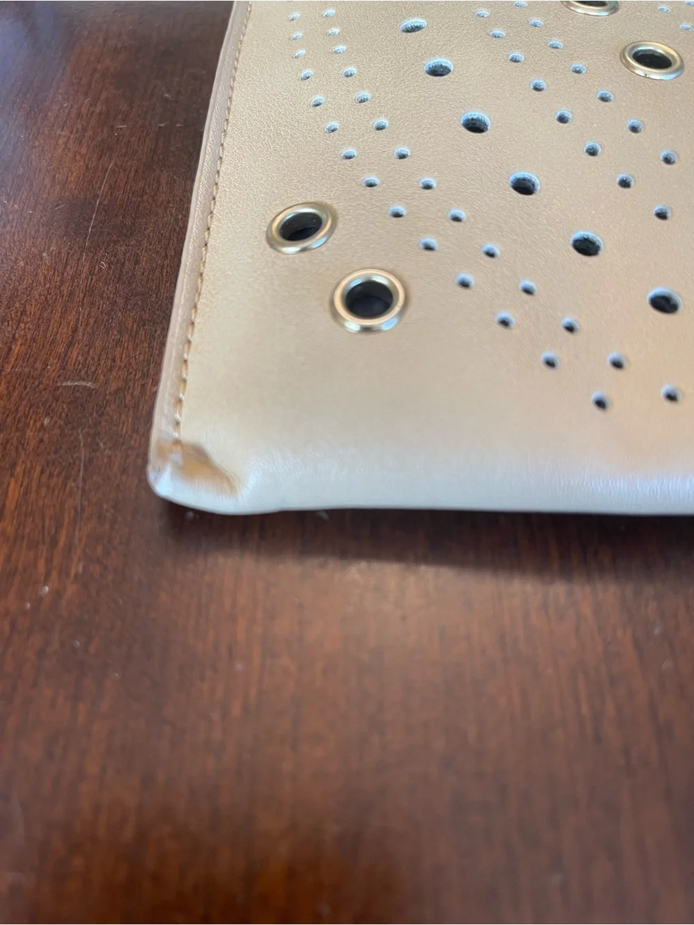 New Directions perforated clutch bag Tan